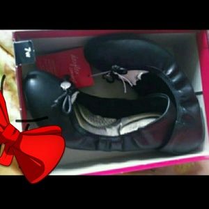 Black flats with bows